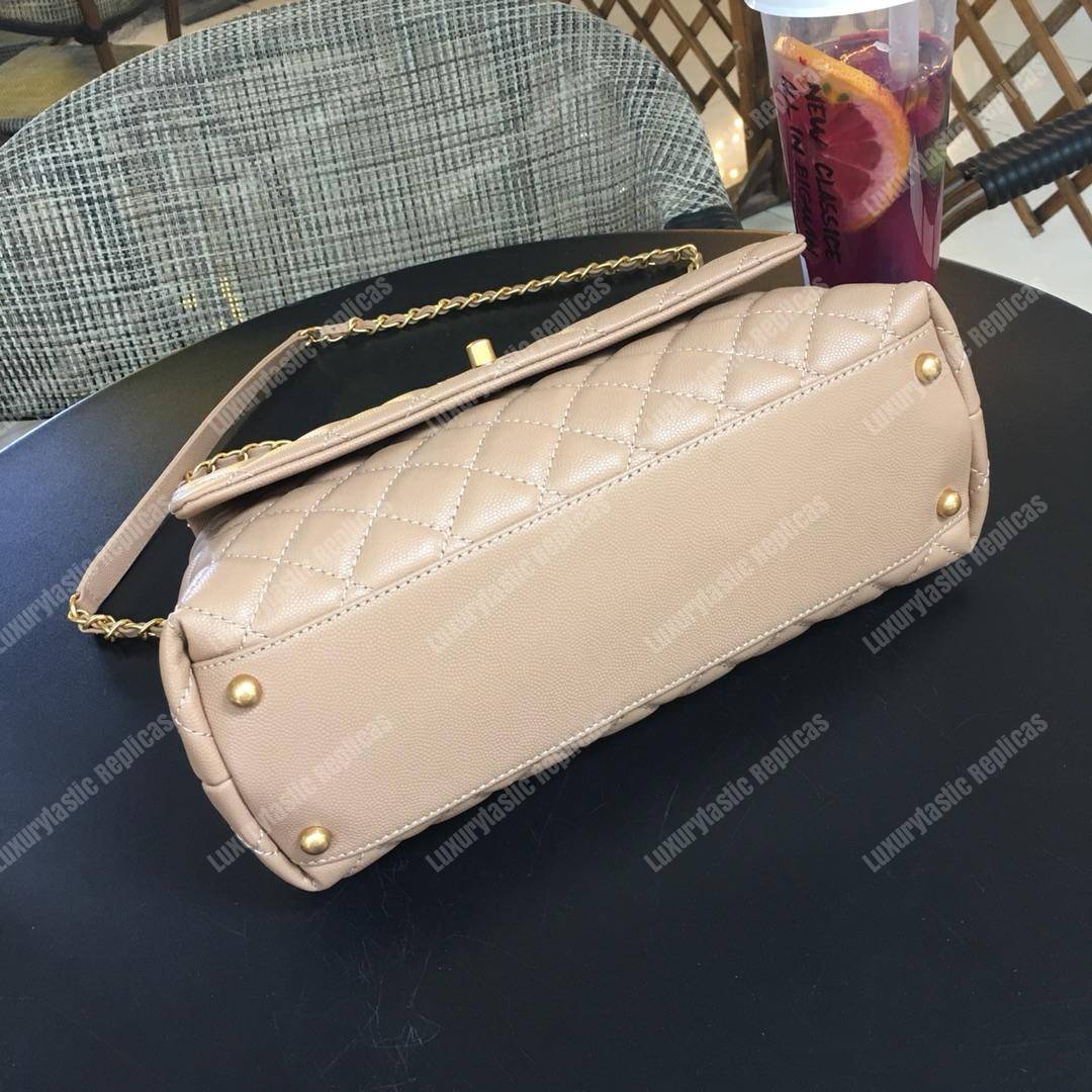 Ch*el flap bag with top handle beige