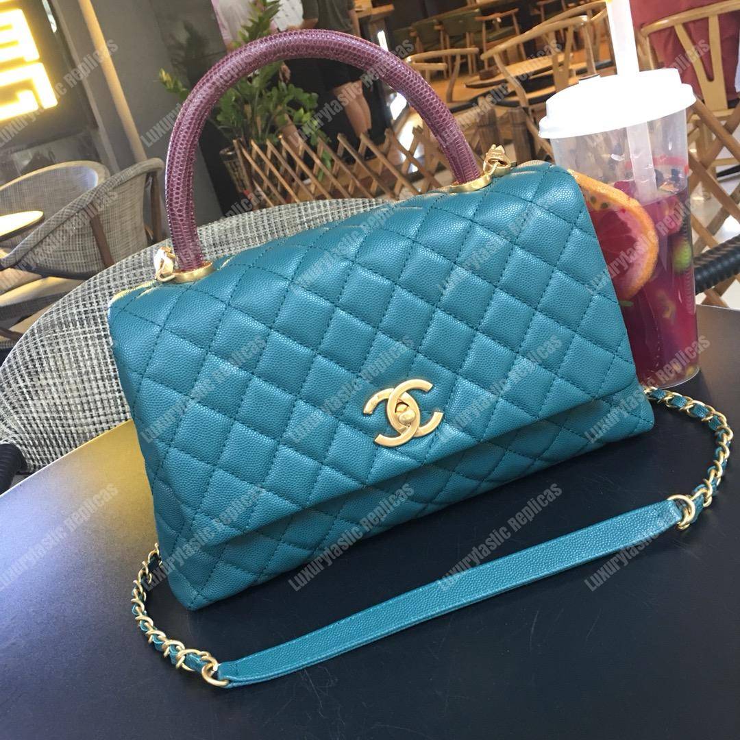 Ch*el flap bag with top handle blue