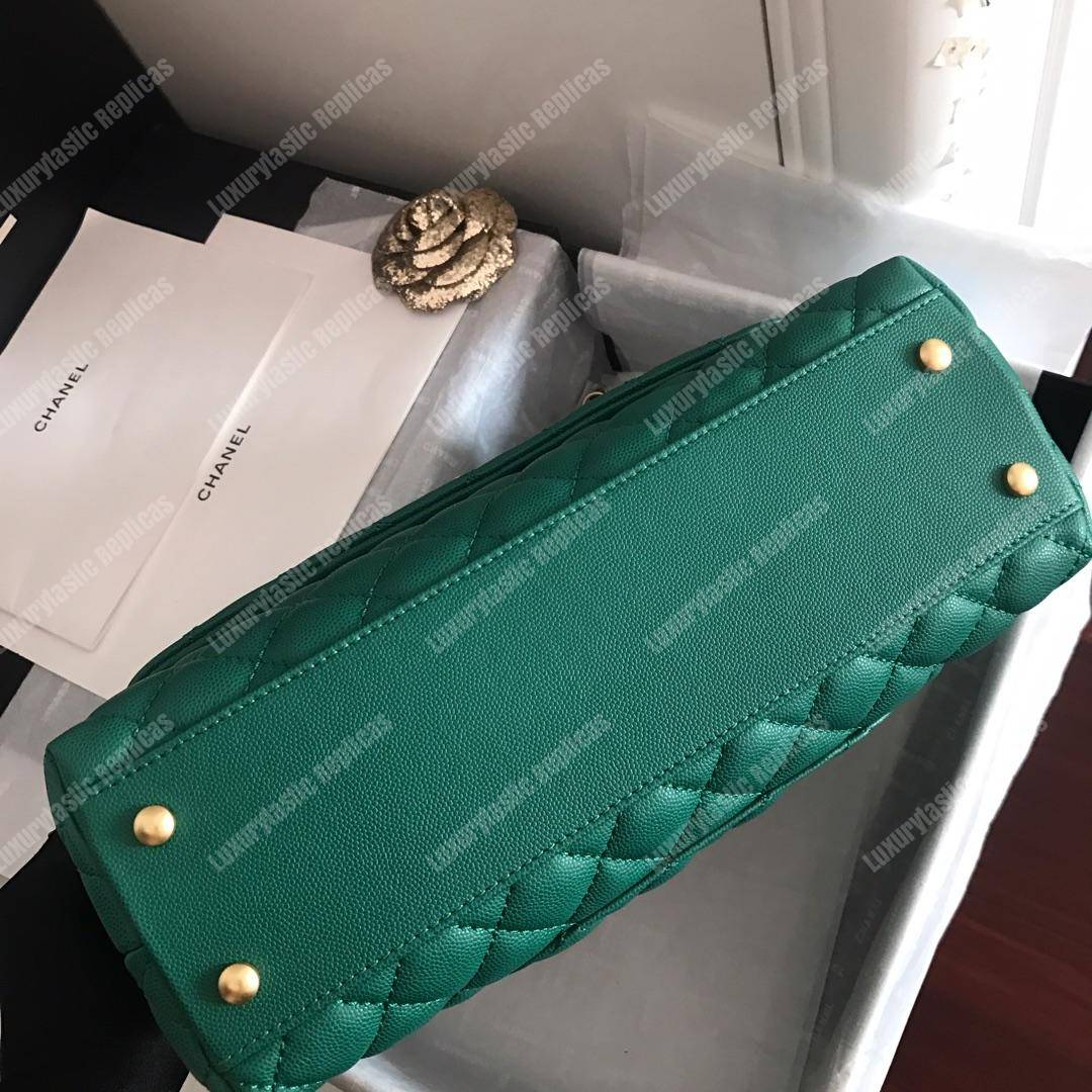 Ch*el flap bag with top handle green