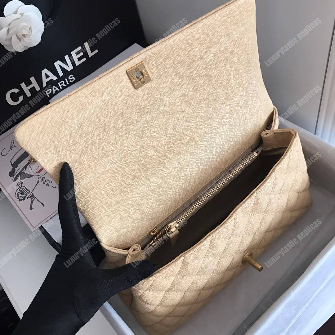 Ch*el flap bag with top handle beige