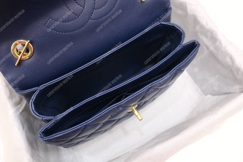Ch*el small flap bag with top handle navy blue-gold