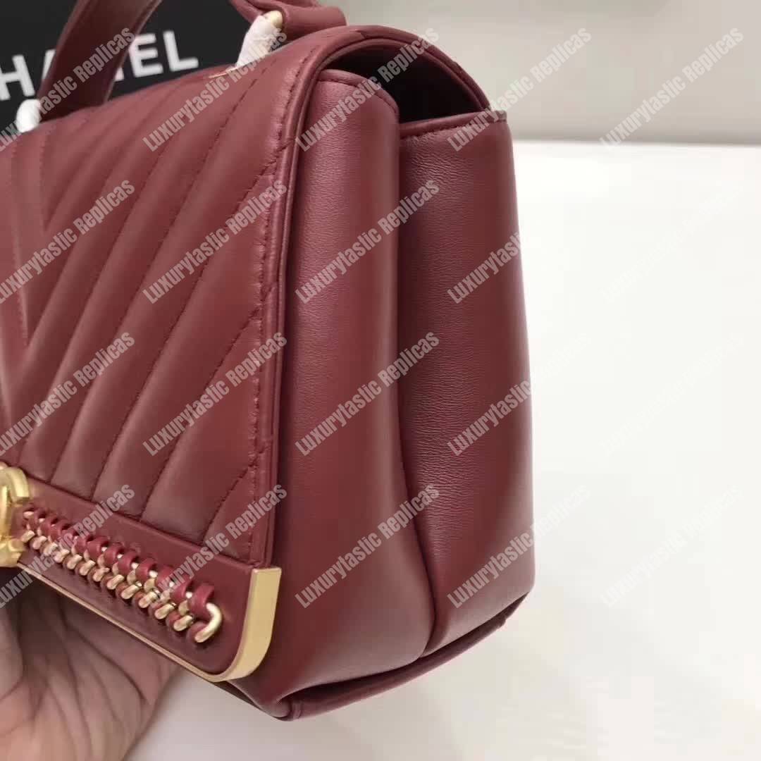 Ch*el chevron stitched chain top handle flap bag red