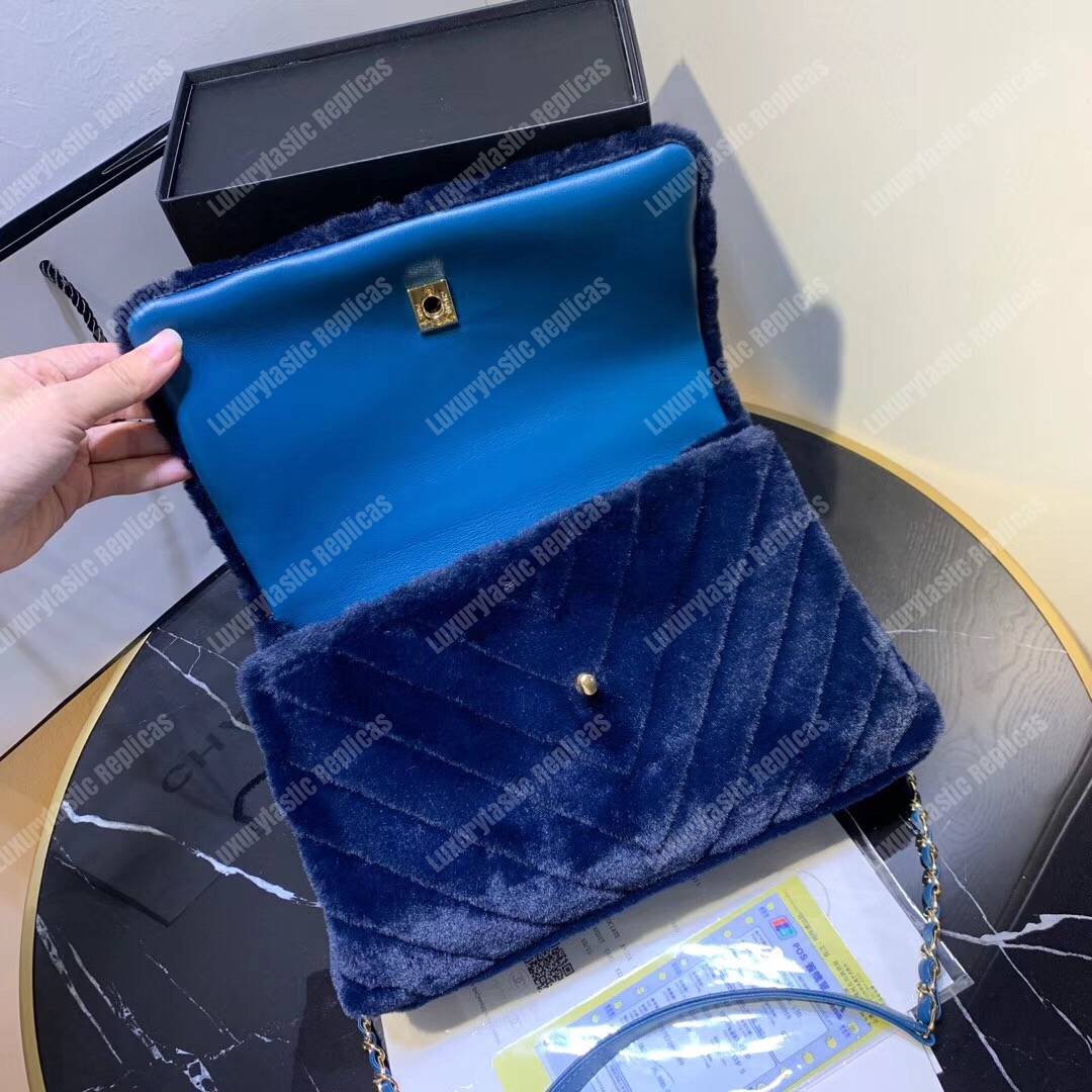 Ch*el flap bag with top handle blue
