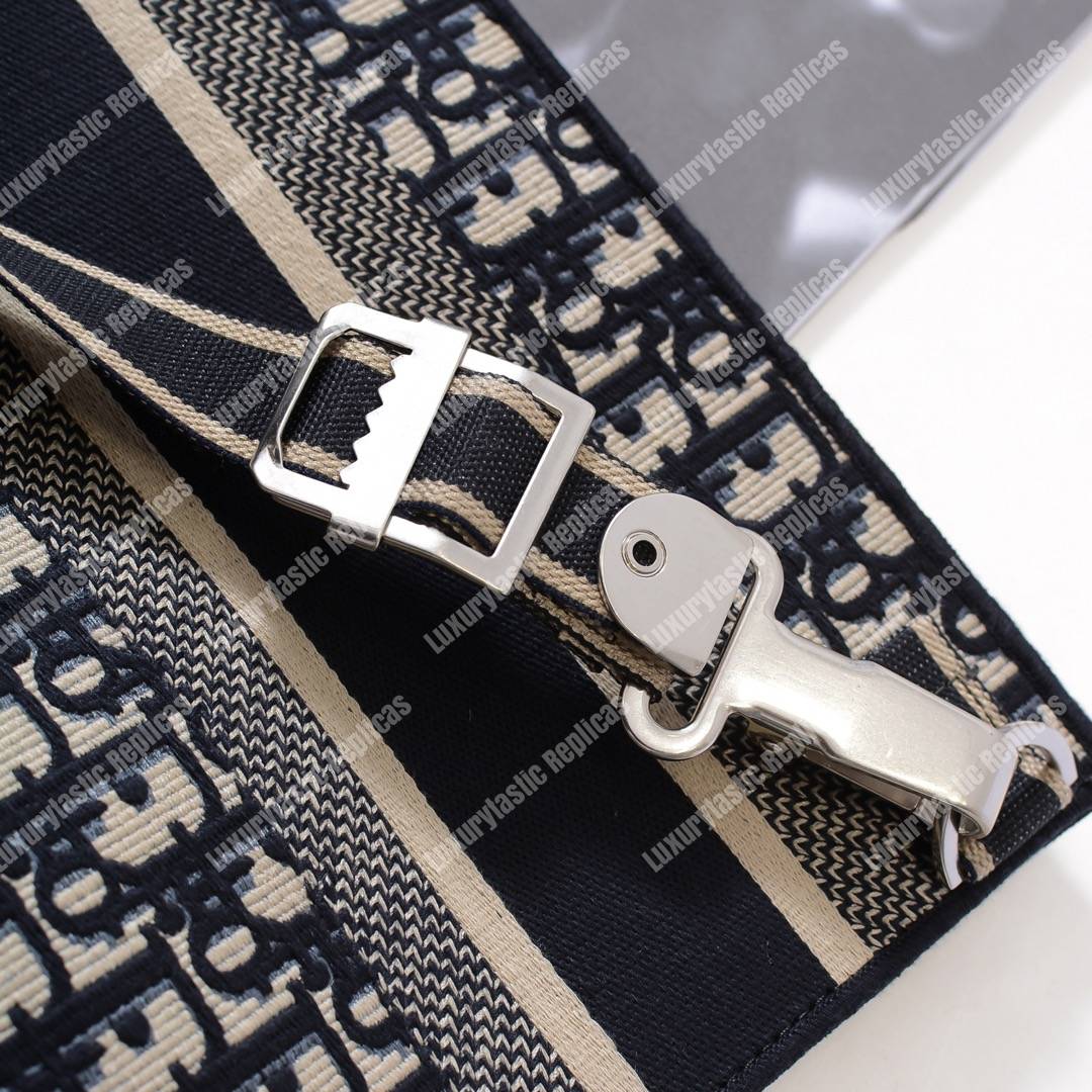 D*or blue oblique embroidered canvas clutch