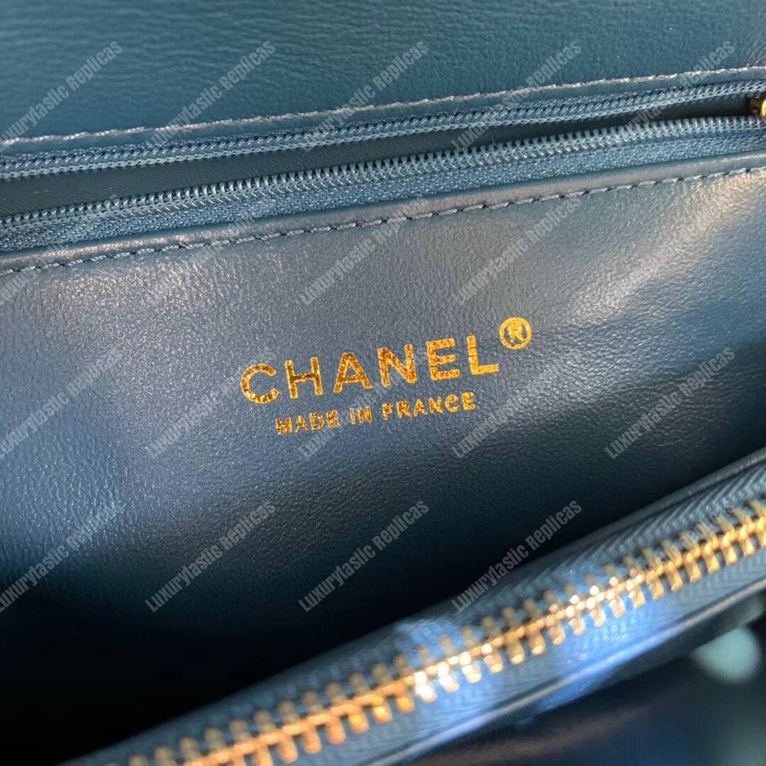 Ch*el flap bag with top handle blue