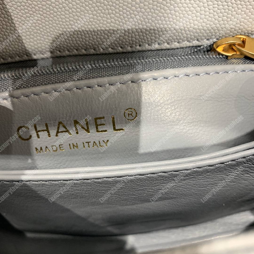 Ch*el flap bag with top handle caviar leather sky blue