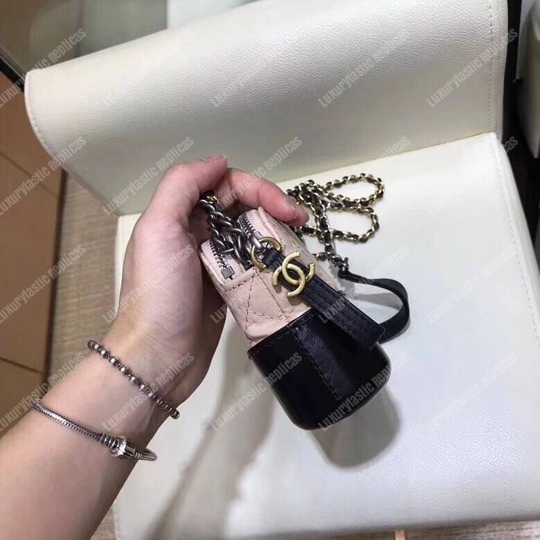 Ch*el clutch with chain beige and black