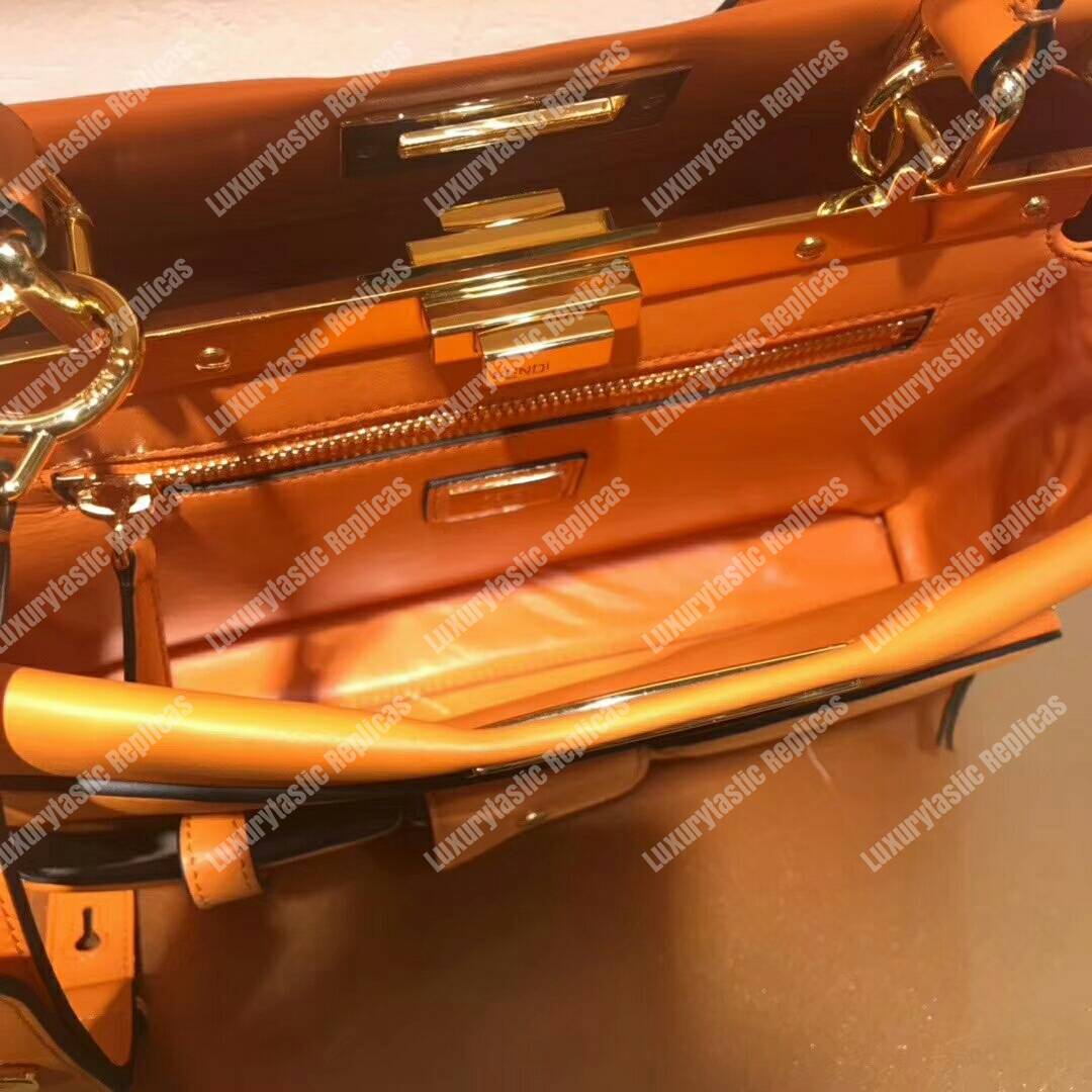 F**di peekaboo iconic medium orange leather bag