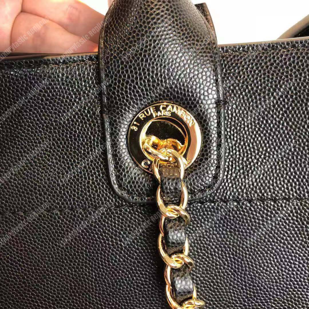 Ch*el studded calfskin small deauville tote bag gold-tone