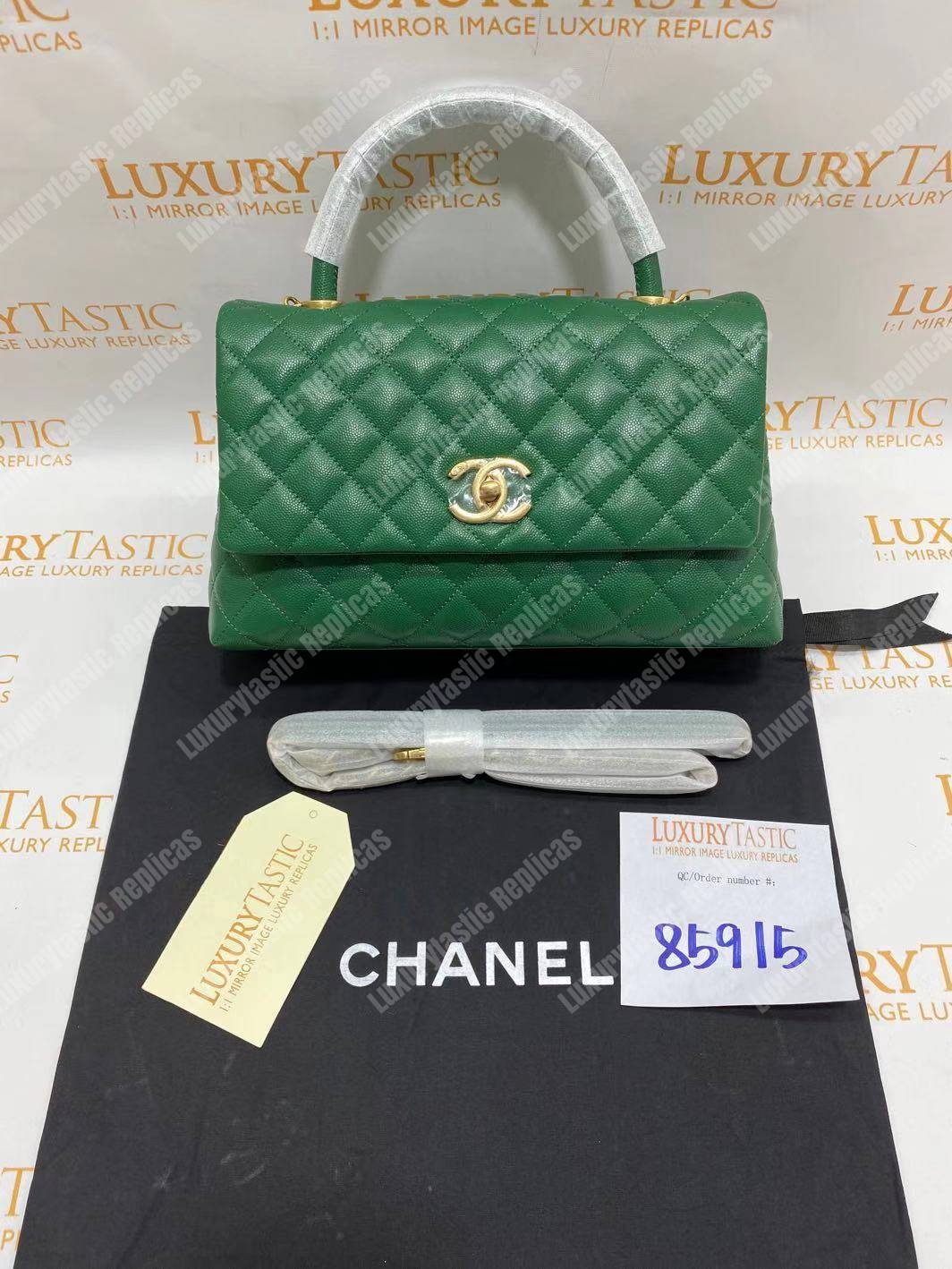Ch*el flap bag with top handle green
