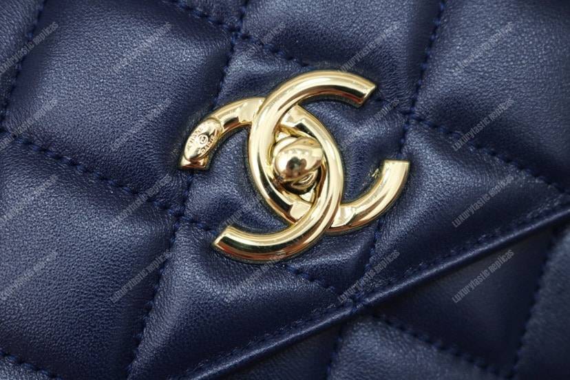Ch*el small flap bag with top handle navy blue-gold