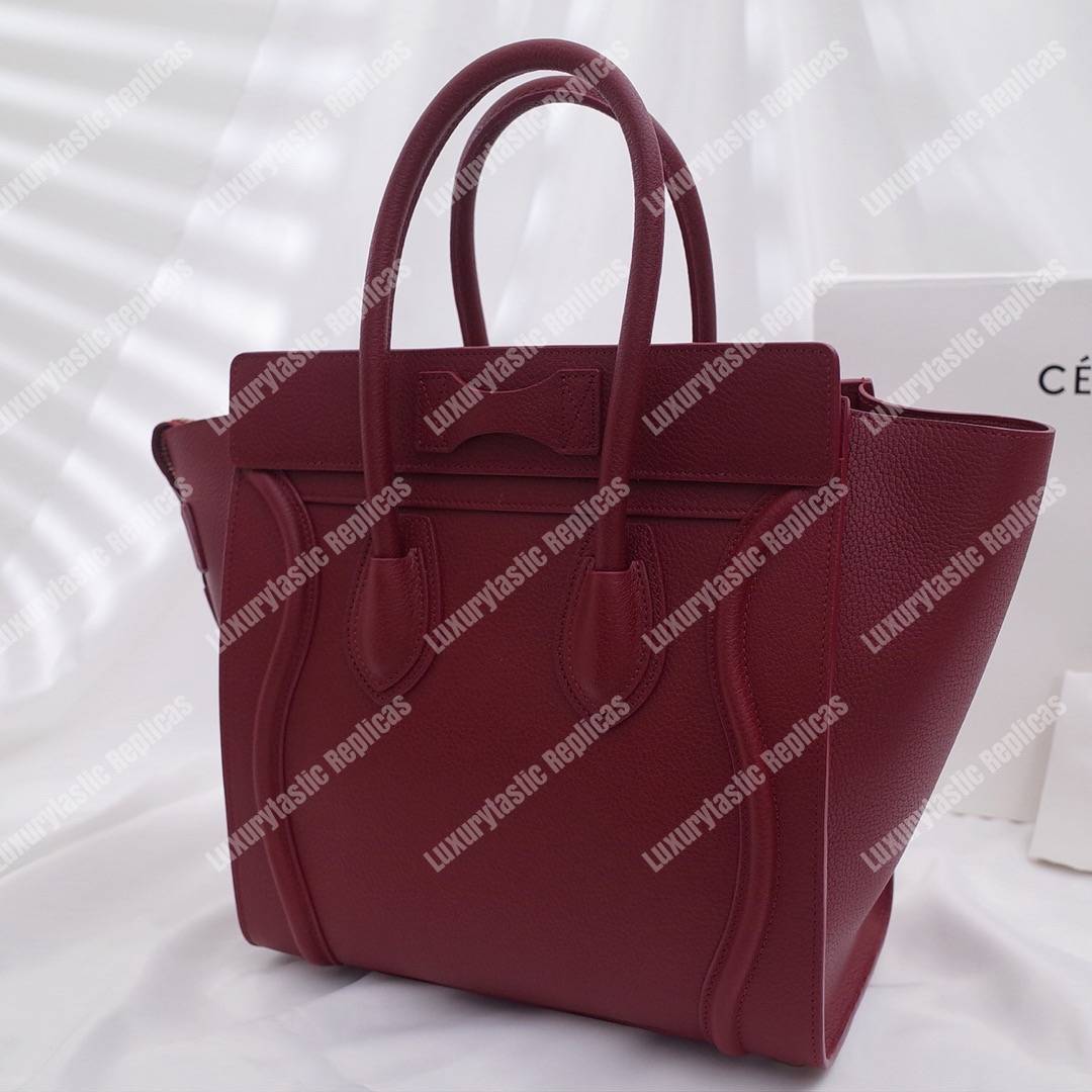 Micro Luggage Handbag In Drummed Calfskin Light Burgundy