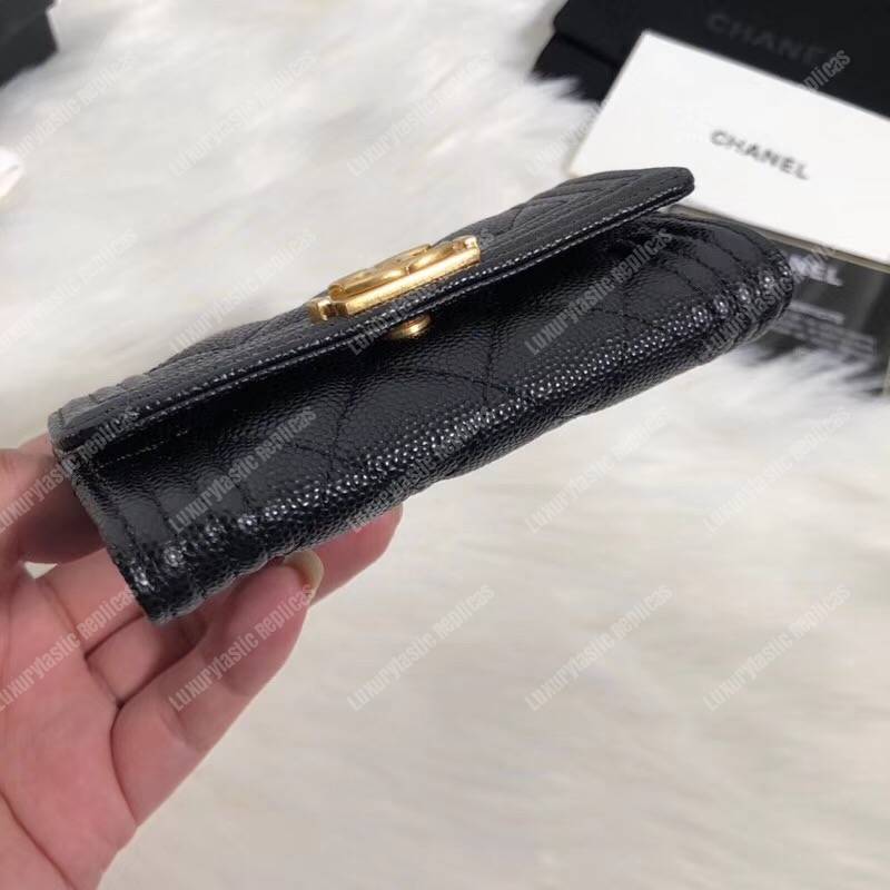Ch*el boy small flap wallet black