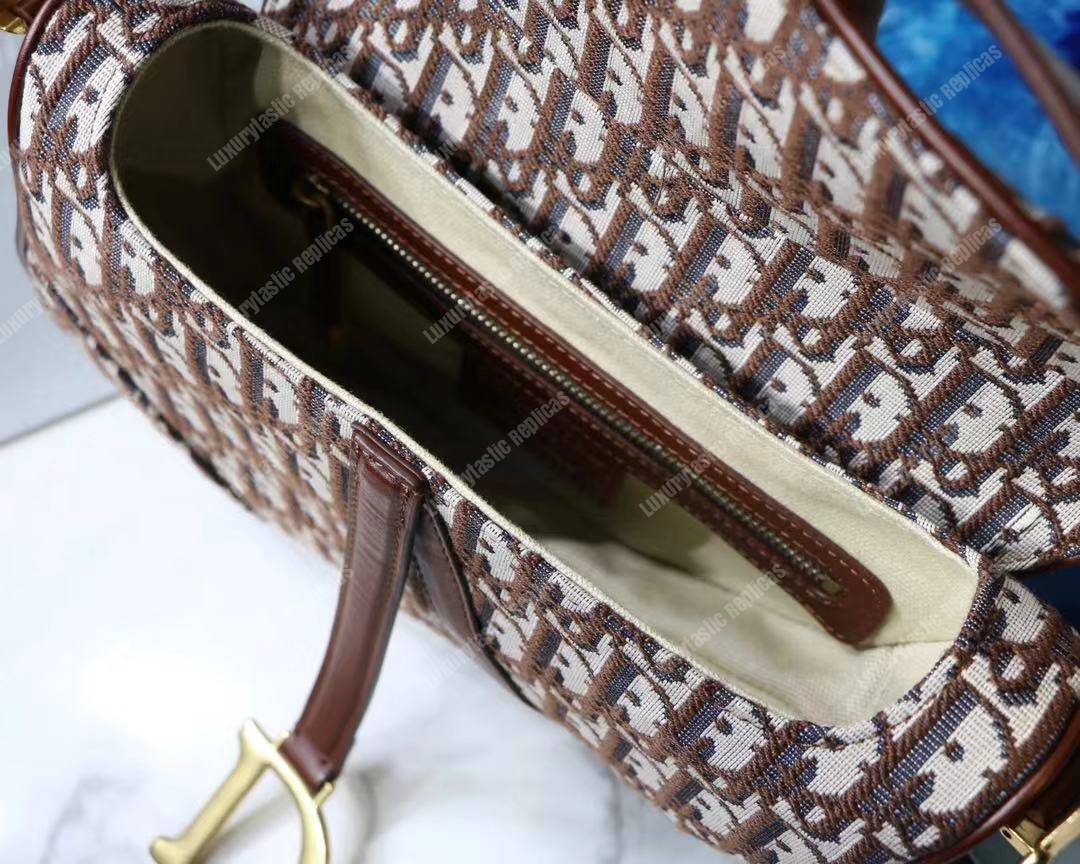 D*or burgundy oblique saddle bag
