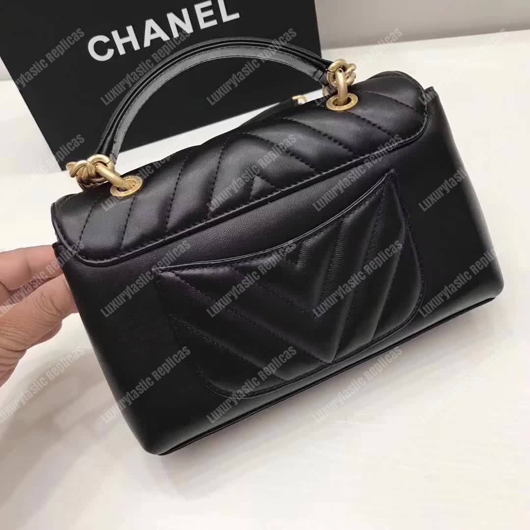 Ch*el chevron stitched chain top handle flap bag black