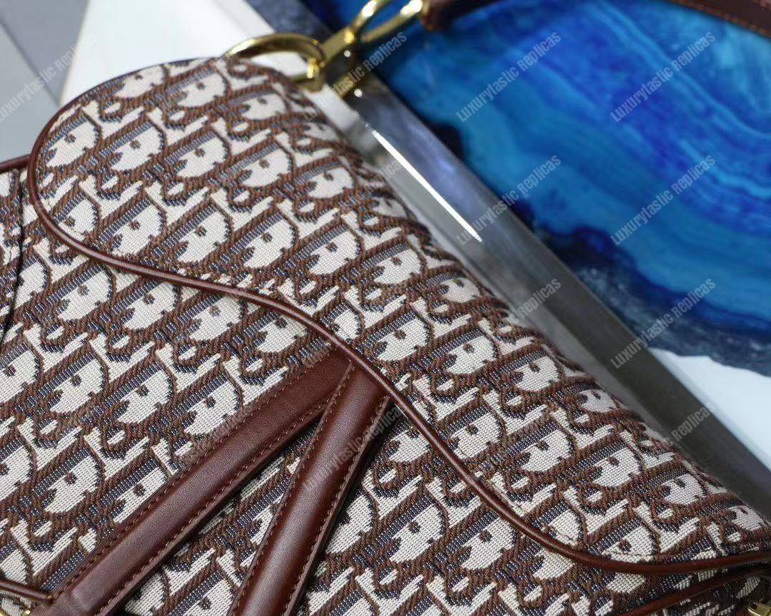 D*or burgundy oblique saddle bag