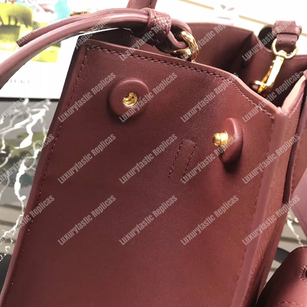 pra*a monoCh*0me saffiano leather bag brown