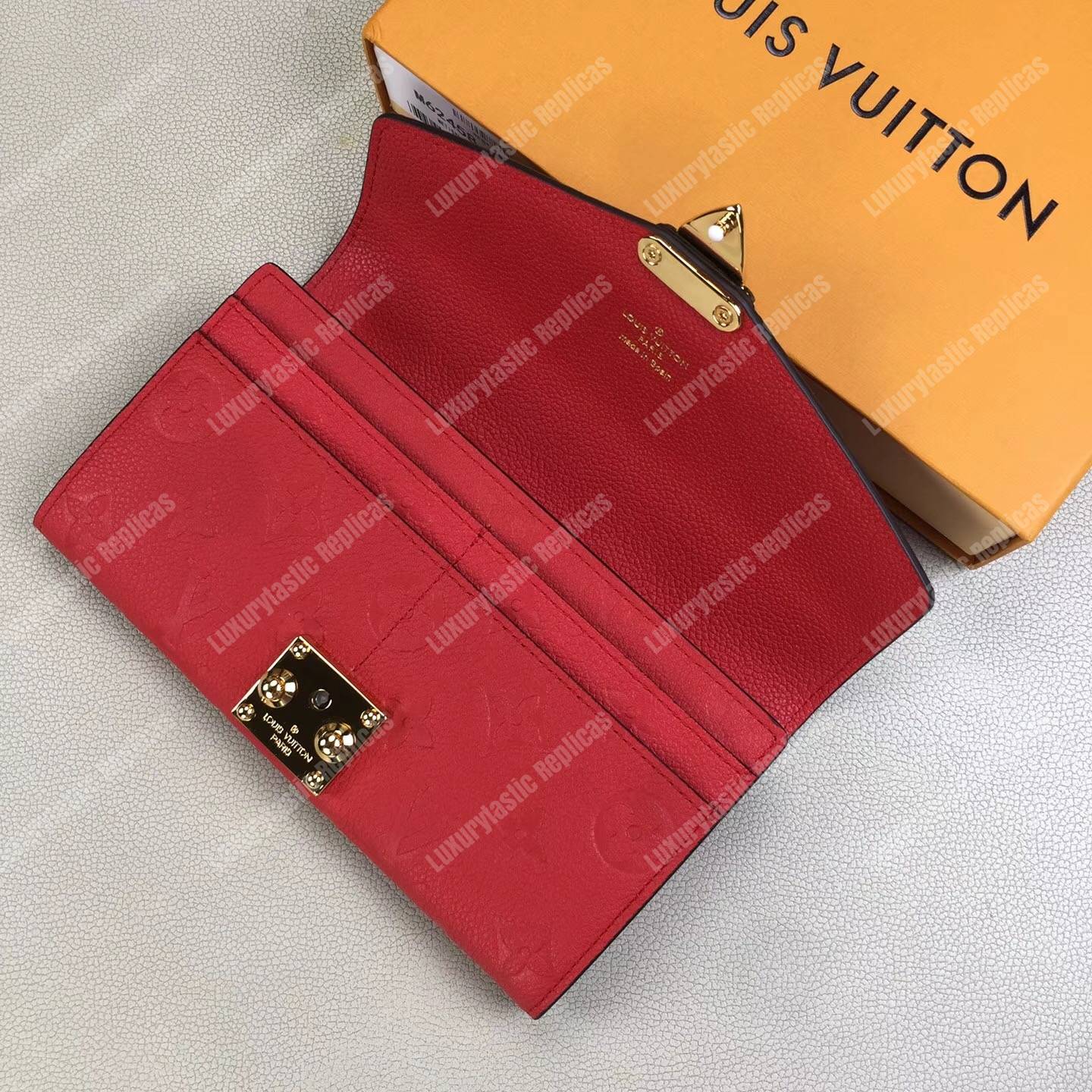 LV Metis Wallet Monogram Empreinte Leather Scarlet
