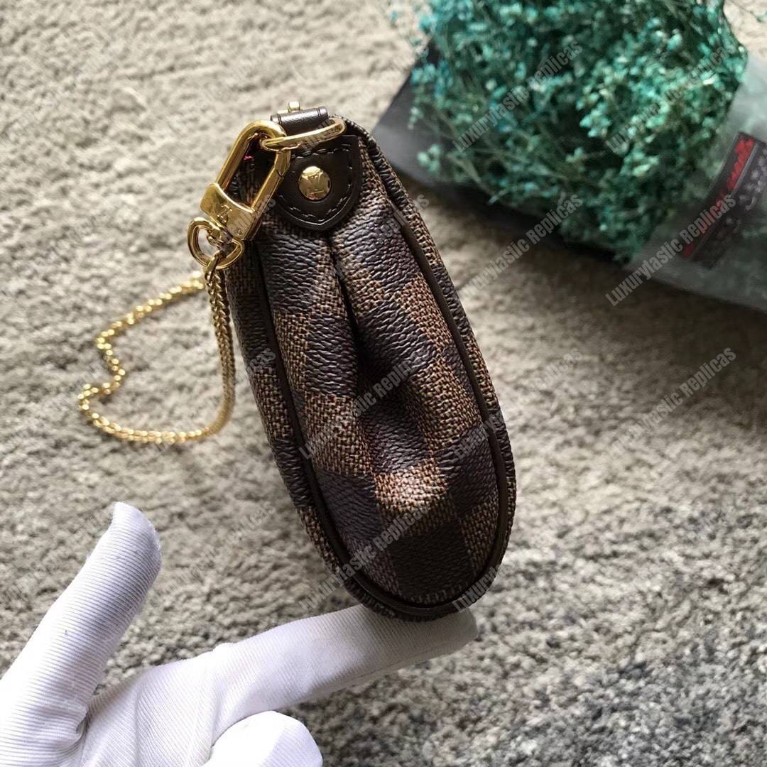 LV Eva Clutch Damier Ebene Canvas