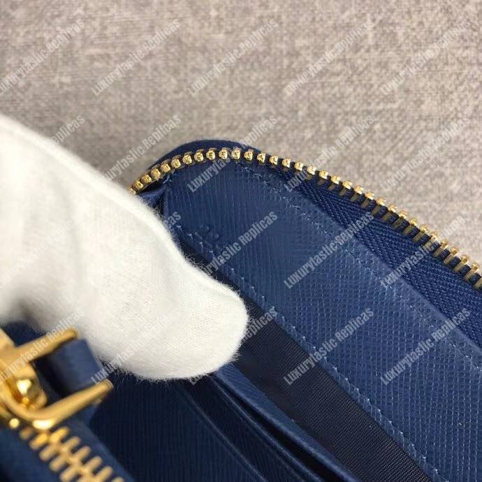 Pra*a large saffiano leather wallet blue gold hardware