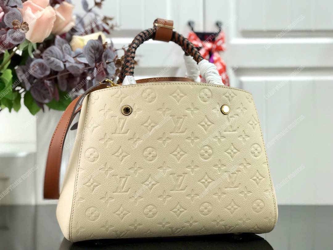 LV Montaigne MM Monogram Empreinte leather Creme