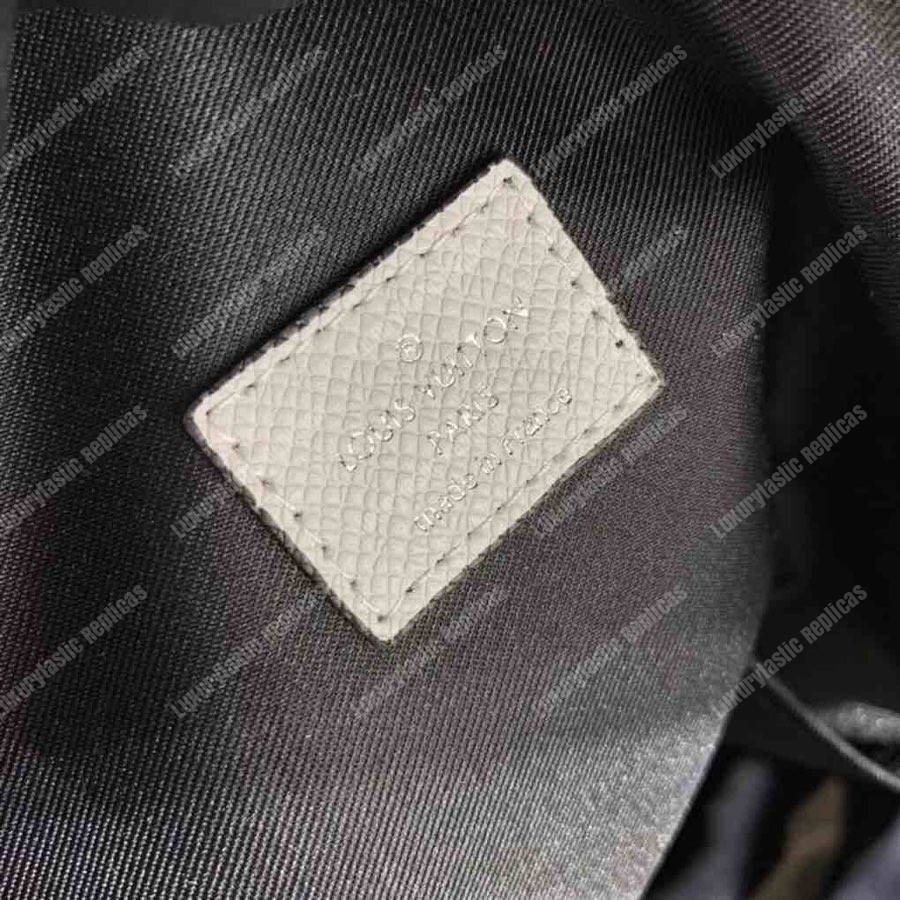 LV Discovery Backpack PM Taiga Leather Monogram White