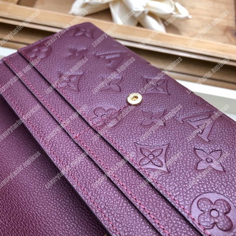 LV Sarah Wallet Monogram Empreinte Leather Raisin Purple