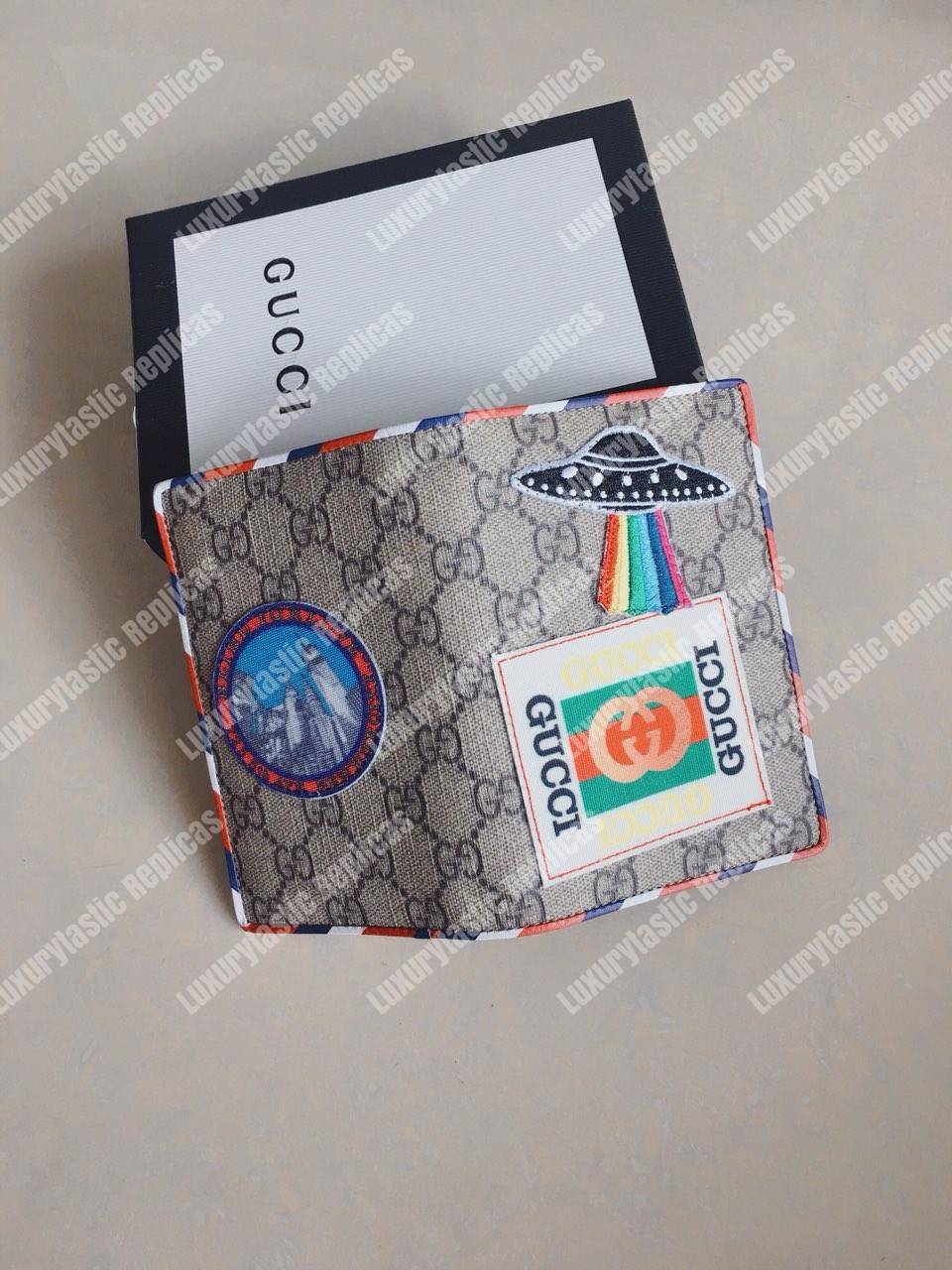 G*u*i courrier gg sup*e passport case beige ebony