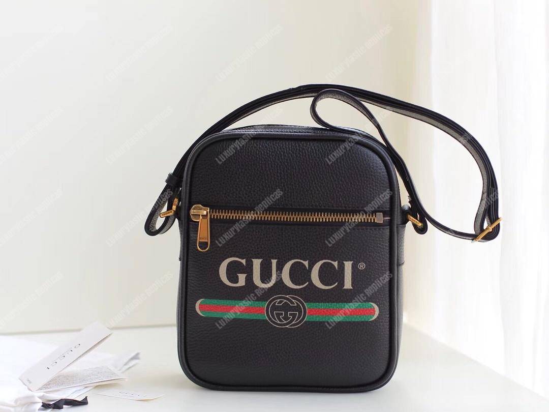G*u*i print messenger bag black leather