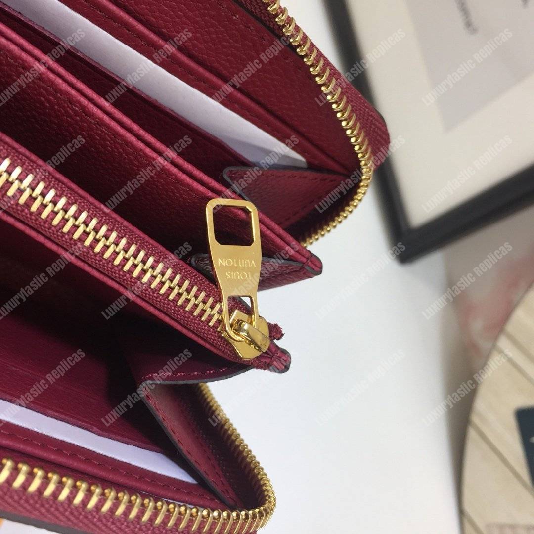LV Clemence Wallet Monogram Empreinte Leather Aurore