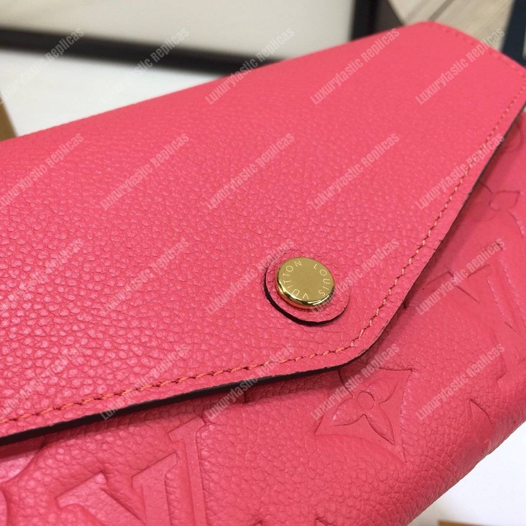 LV Sarah Wallet Monogram Empreinte Leather Scarlet