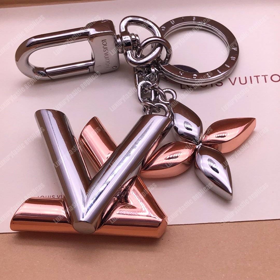 LV Twist Bag Charm Monogram Flower Silver Pink