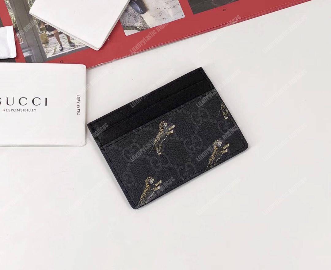 G*u*i gg card case with tiger print
