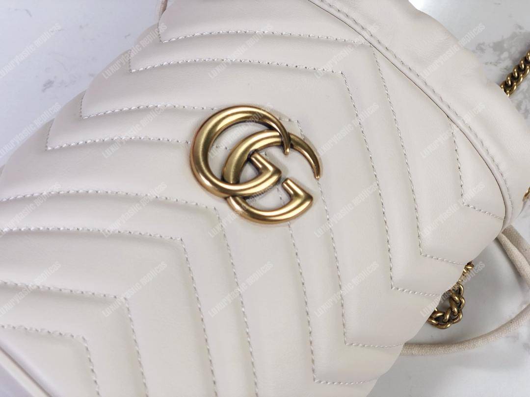 G*u*i gg marmont mini bucket bag white