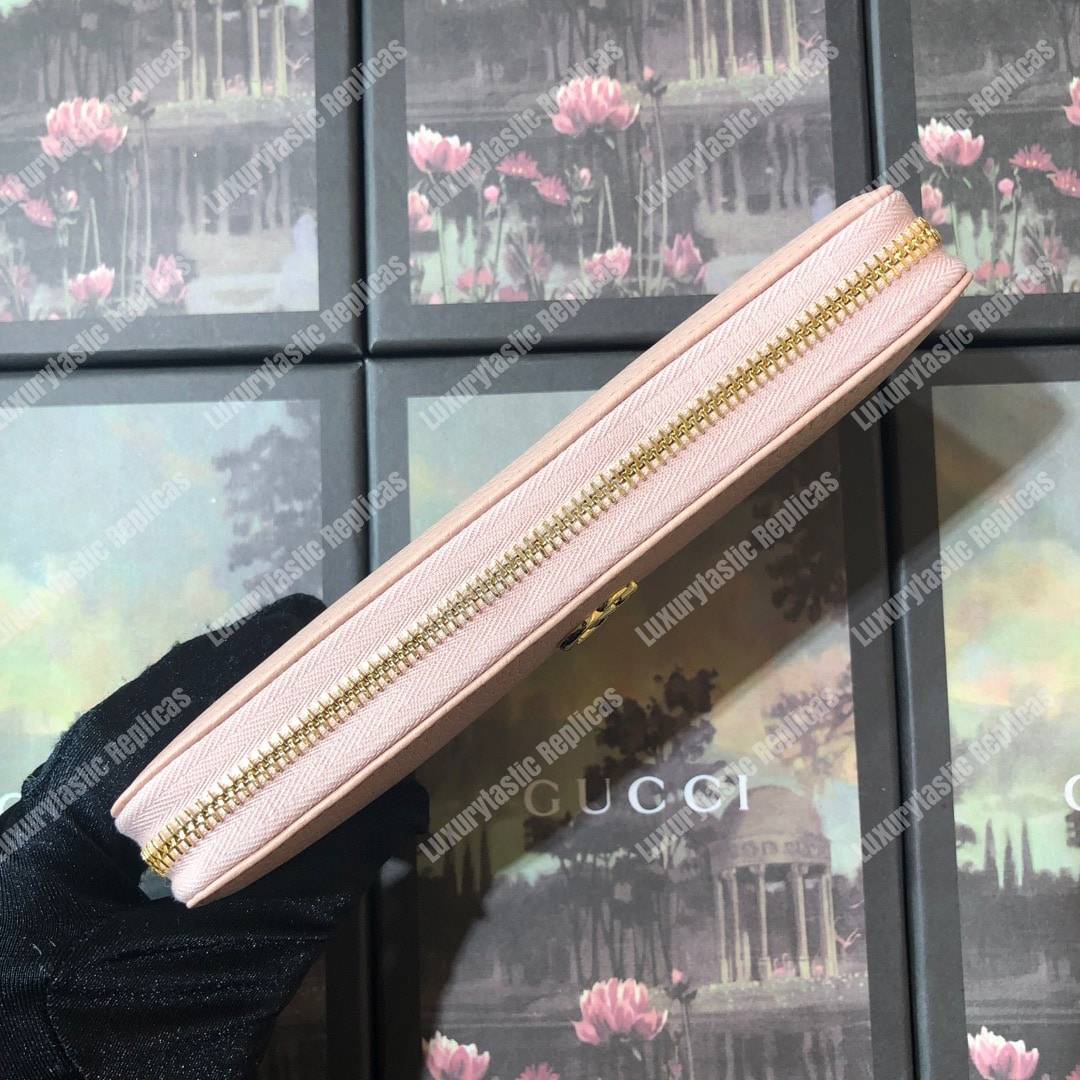 G*u*i leather zip around wallet light pink