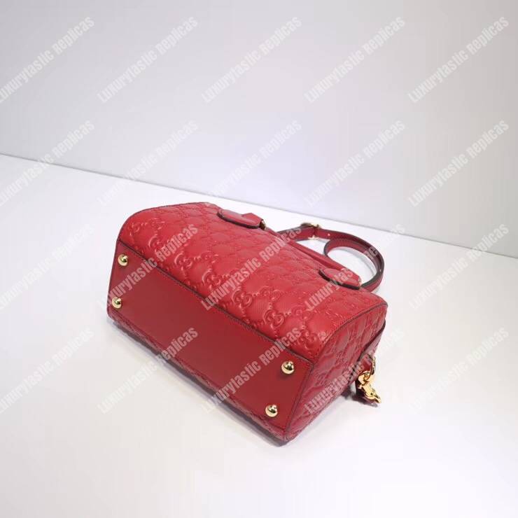 G*u*i signature small top handle bag red