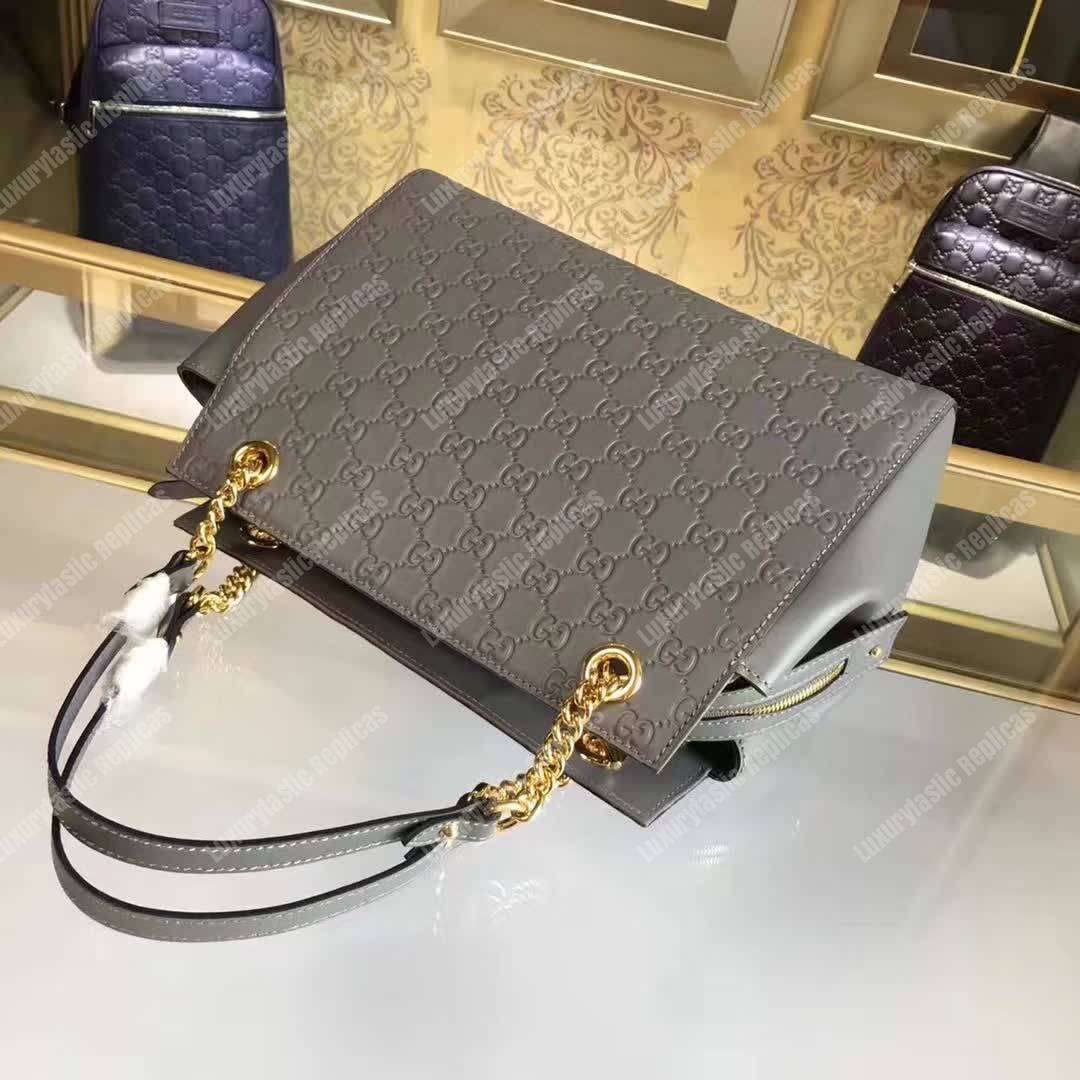 G*u*i signature medium top handle bag gray