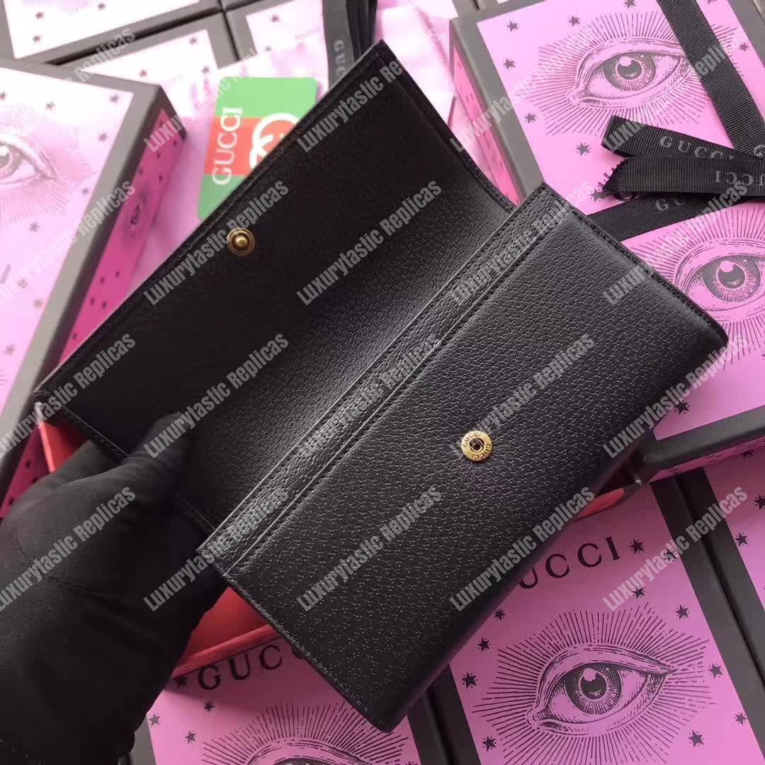 G*u*i leather continental wallet black
