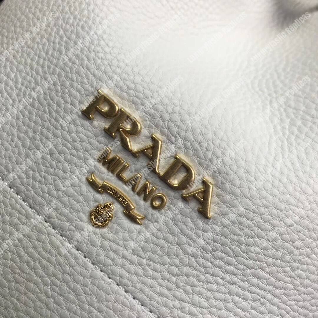 Pra*a leather bucket bag white