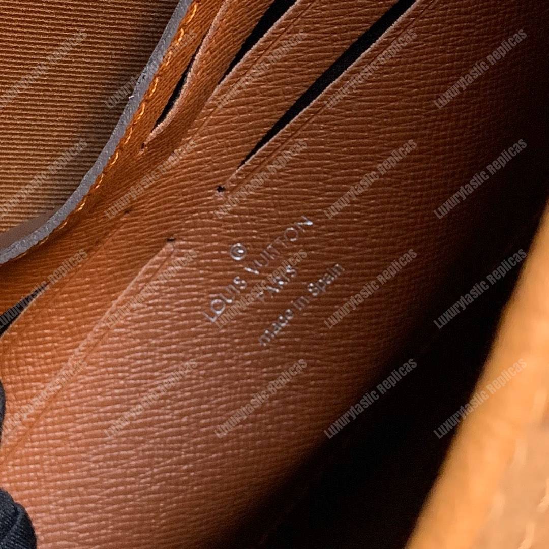LV Pochette Voyage Ostrich Skin