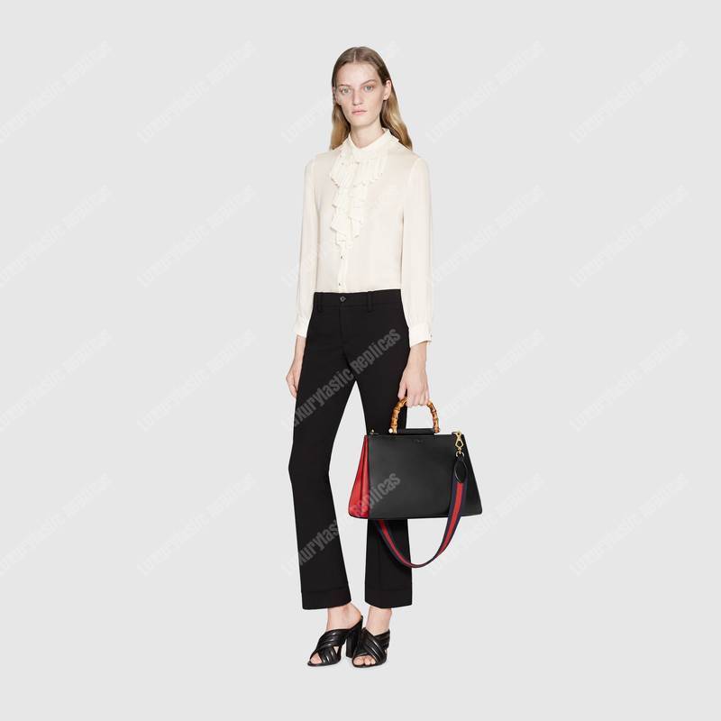G*u*i nymphaea leather top handle bag
