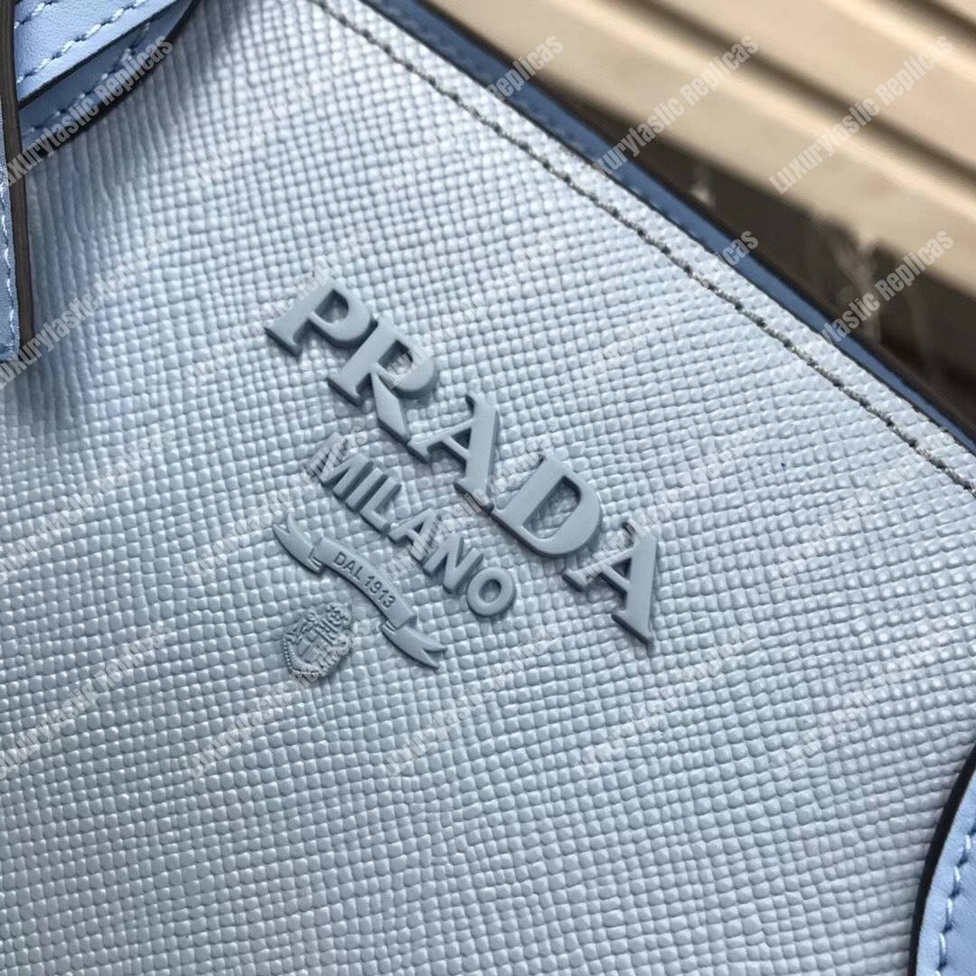 pra*a monoCh*0me saffiano leather bag light blue