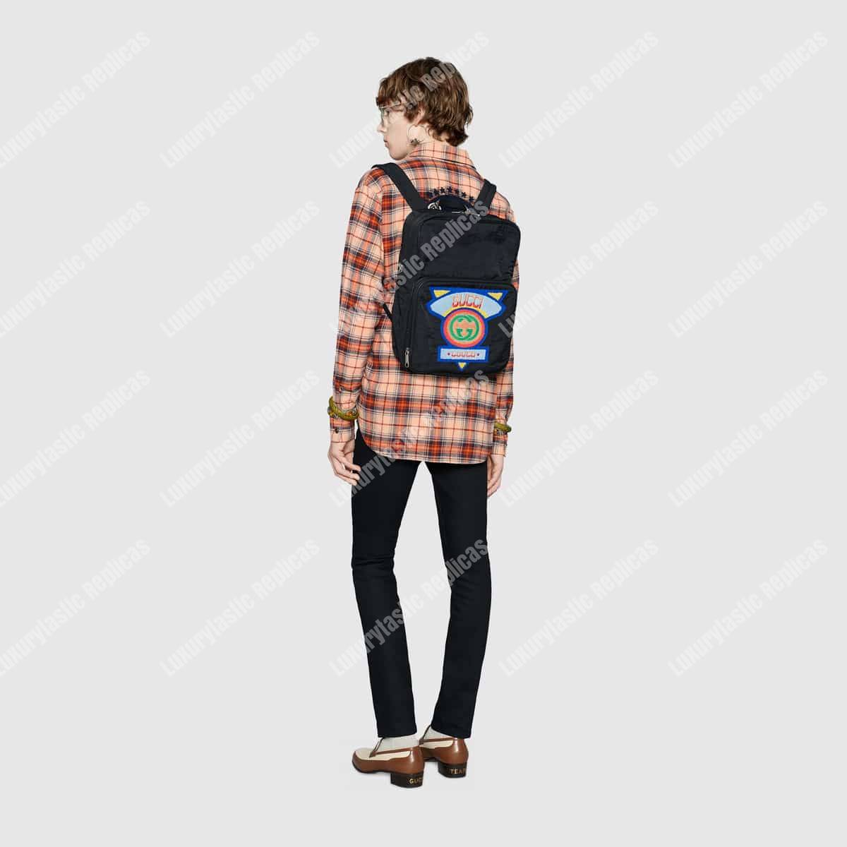 G*u*i medium backpack with G*u*i ’80s patch black