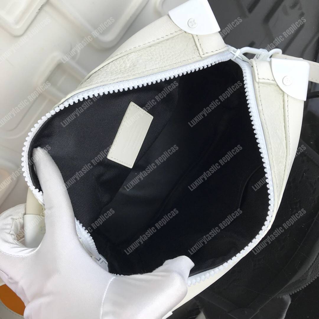 LV Soft Trunk Taurillon Monogram Leather Powder