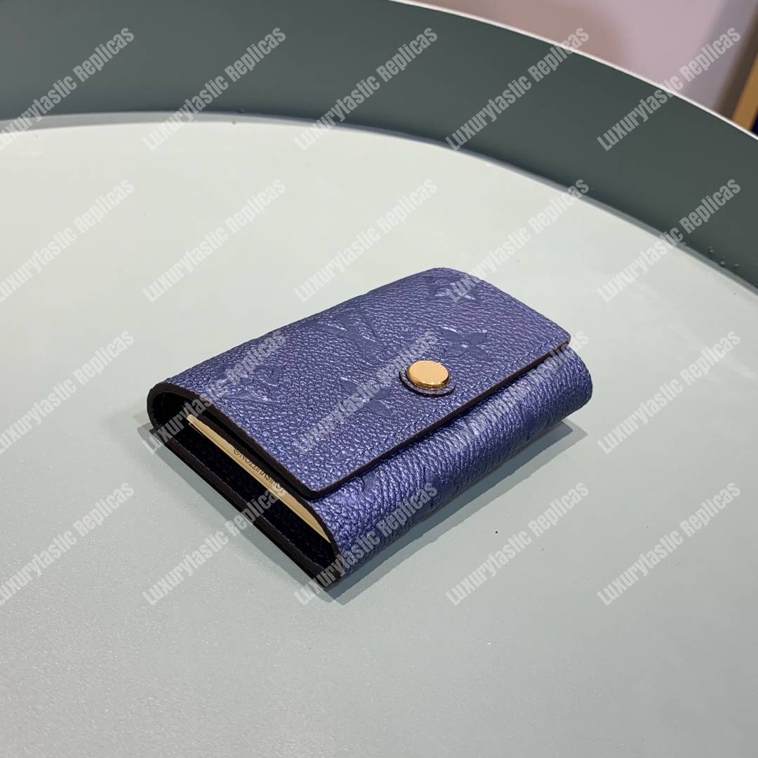 LV 6 KEY HOLDER Monogram Empreinte leather Iris
