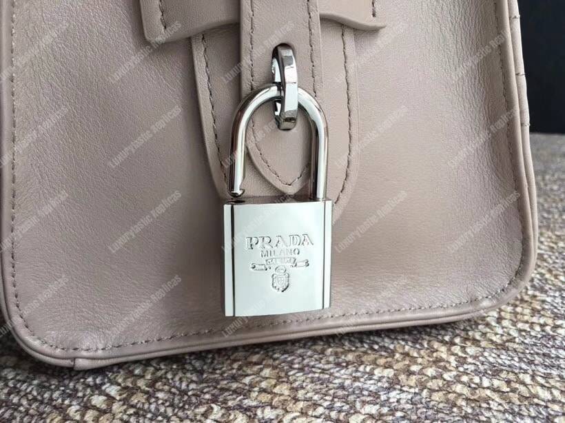 Pra*a diagramme leather handbag powder pink