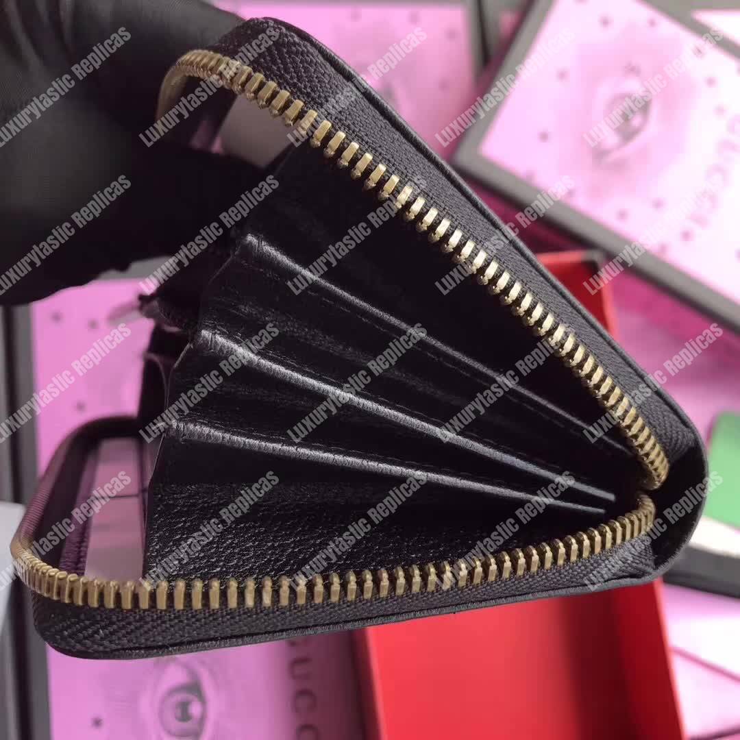 G*u*i leather zip around wallet black