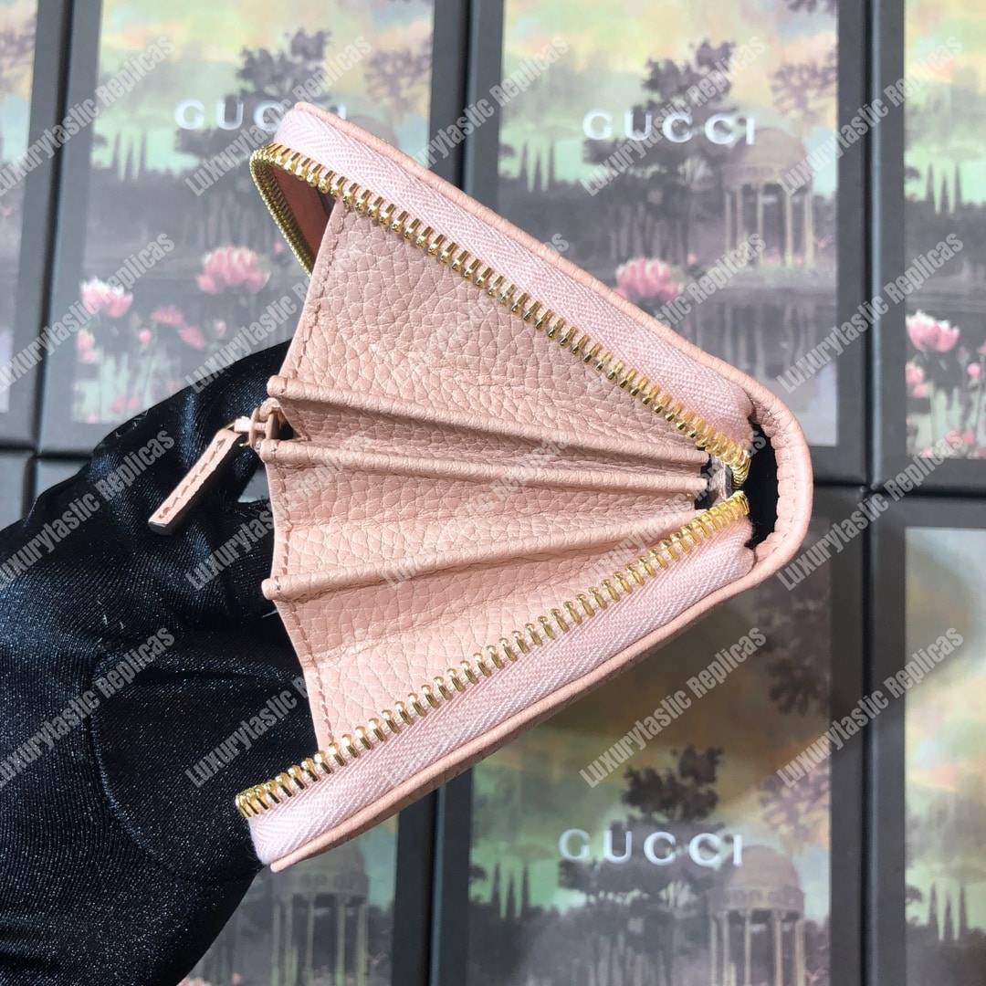 G*u*i leather zip around wallet light pink