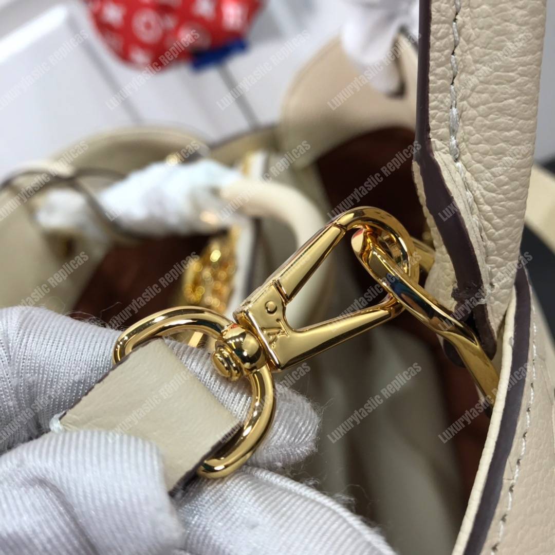 LV Montaigne MM Monogram Empreinte Crème Handbag