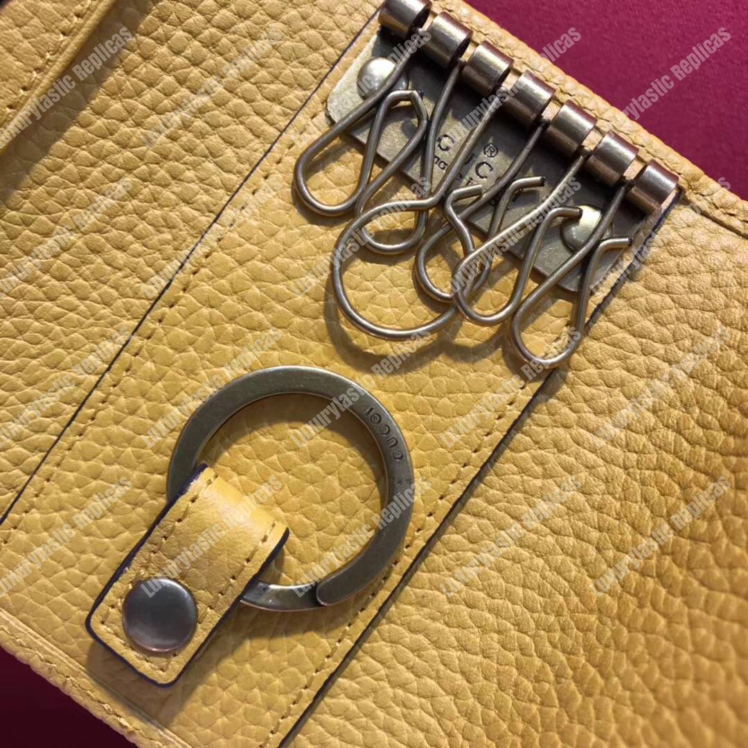 G*u*i garden leather key case yellow with bat